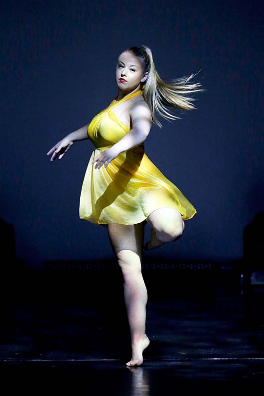 dancer performs on stage